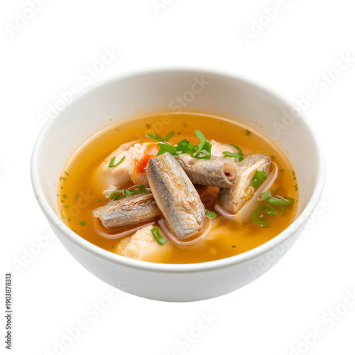 Warm Soup With Fish and Dumplings Served in a White Bowl at a Kitchen Table D...