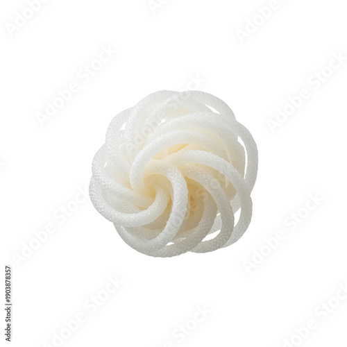 White Spiral Decoration Resting on a Flat Surface in a Bright Setting With Cl...