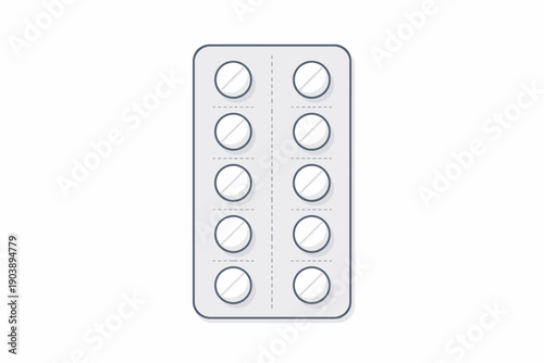 Blister pack of white round pills on white background