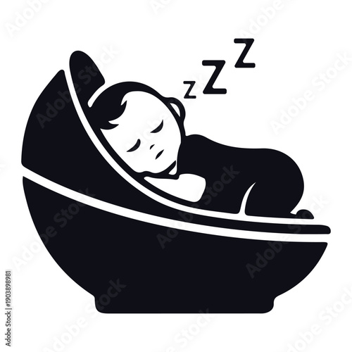 Newborn baby sleeping peacefully in a bassinet