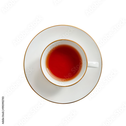 Cup of Tea Placed on a Saucer With a Golden Rim in a Cozy Setting in the Afte...