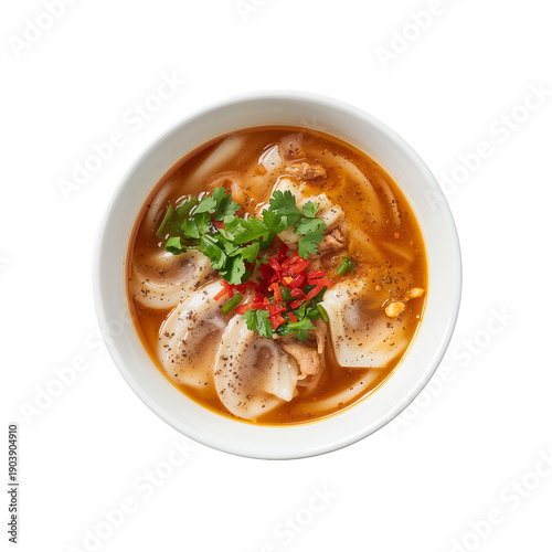 Wonton Soup With Herbs and Spices Served in a White Bowl on a Plain Background