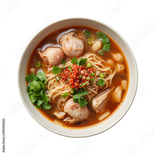 Wonton Soup With Herbs and Spices Served in a White Bowl on a Plain Background