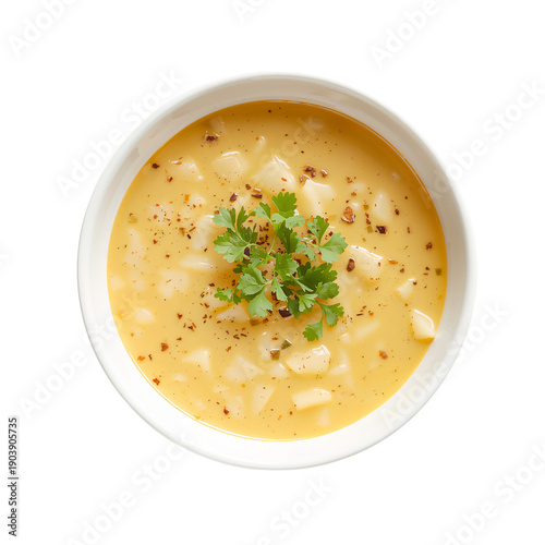 Creamy Soup With Herbs Served in a Bowl on a White Background