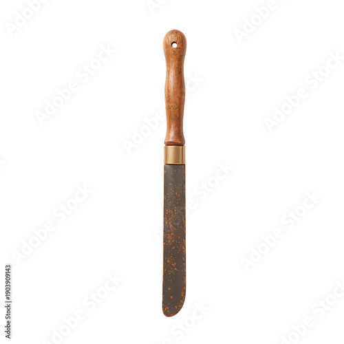 Old Knife With Wooden Handle Resting on a Plain Surface in a Well-Lit Kitchen