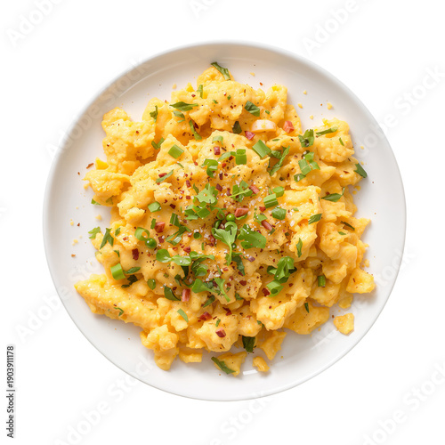 Scrambled Eggs With Green Onions and Spices Served on a White Plate for Break...