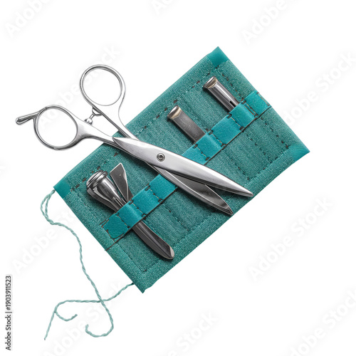 Set of Sewing Tools on a Green Fabric Surface in a Well-Lit Area During the D...