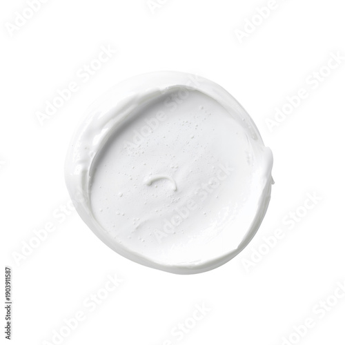 White Cream Spread on a Circular Surface Ready for Application During a Beaut...