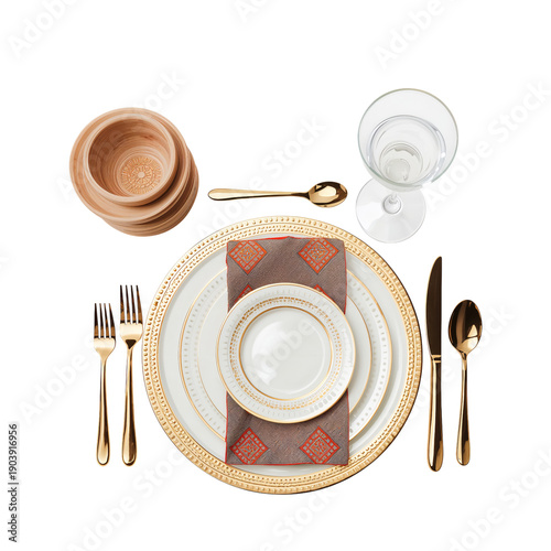 Elegant Table Setup With Gold Utensils and Multiple Plates for a Special Occa...