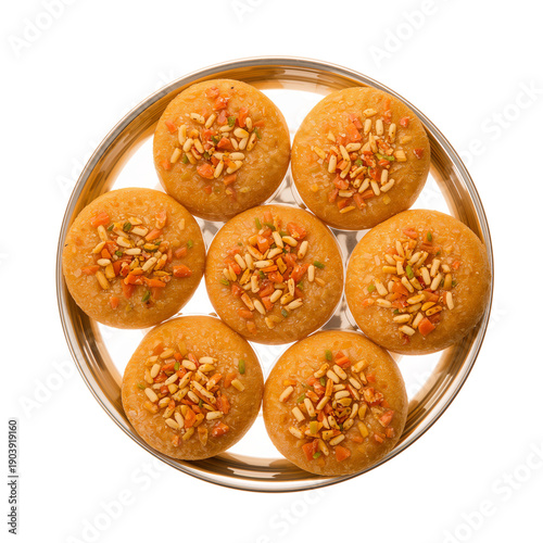 Indian Sweets Served on a Round Platter at a Celebration During the Evening