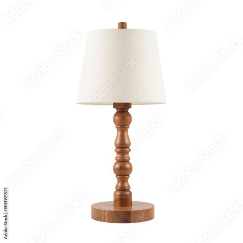 Wooden Lamp With a Fabric Shade Stands on a Table in a Well-Lit Room During D...