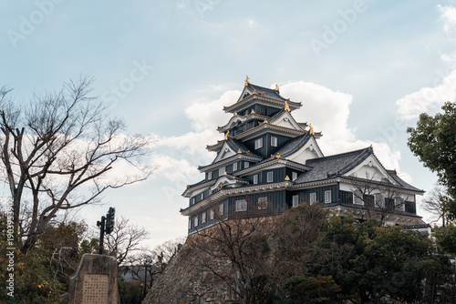Historic Okayama Castle With Unique Architecture Under Blue Sky
