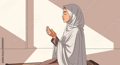 A Muslim woman in a white hijab and robe praying indoors during Ramadan with hands raised.