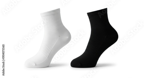 Pair of white and black ankle socks on white background