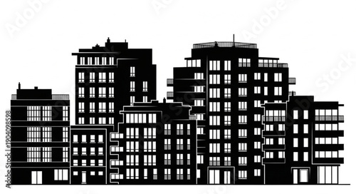 Silhouette of modern apartment buildings in a city skyline.