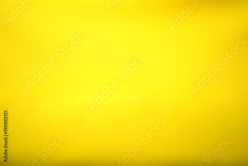 The gleaming yellow background surface is smooth, luxurious, and beautiful.