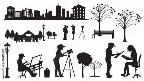 Silhouettes of artists and photographers at work in urban park