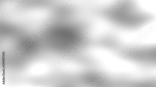 A blurred abstract background with soft, indistinct shapes and gentle transitions