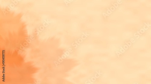 Soft orange abstract background with subtle floral elements and gentle gradients