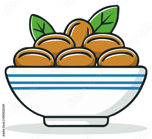 A bowl overflowing with golden brown meatballs and fresh green leaves