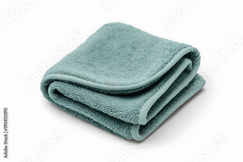 Soft folded green towels on white background for bathroom luxury