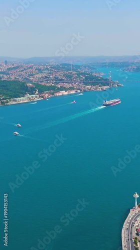 Wallpaper Mural Vertical video. Vertical video. Istanbul, Turkey. Panoramic aerial view of Bosphorus Strait with ships sailing between Europe and Asia on clear sunny day. Aerial View. Rich colors. Rich colors Torontodigital.ca