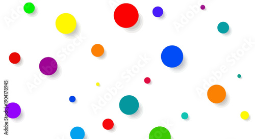 Colorful circles scattered on white background with soft shadows beneath them