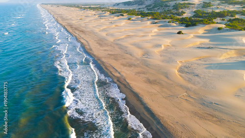 Wallpaper Mural Gelemis, Turkey. Aerial view of long Patara Beach stretching to horizon with mountains, sand dunes and long shadows in morning light. Aerial View Torontodigital.ca