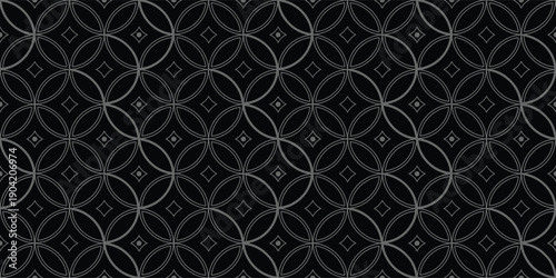 Dark seamless geometric pattern with circular ornamental symmetry on black background. Elegant repeating design ideal for luxury wallpaper, textiles, packaging, and modern surfaces. 