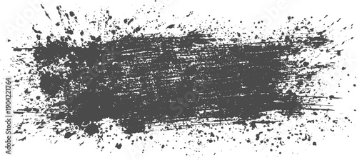 Broad Dark Grey Brush Stroke with Visible Texture and Fine Ink Splatters, Abstract Artistic Background for Creative Design, Posters, Digital Art, and Graphic Projects.