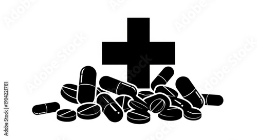 Pills and a cross symbol on a simple background viewed from directly above