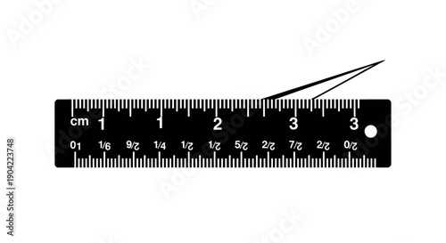 Close-up view of a black ruler with a bent measuring line marker