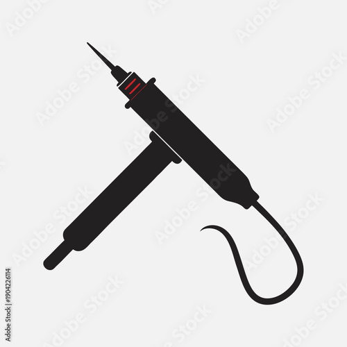 A black corded electric tattoo machine with a needle