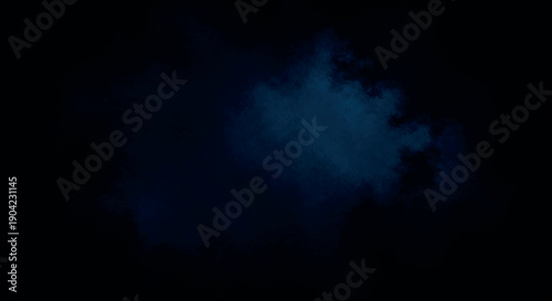 Dark abstract black background with deep blue smoky glow and moody atmospheric cinematic texture