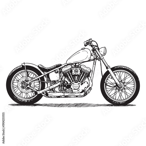 Black and white of a classic chopper motorcycle with detailed engine and wheels