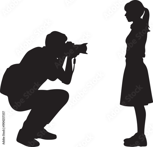 Photographer capturing a portrait of a young girl a striking silhouette