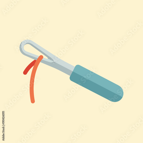 Needle and orange thread on pastel background