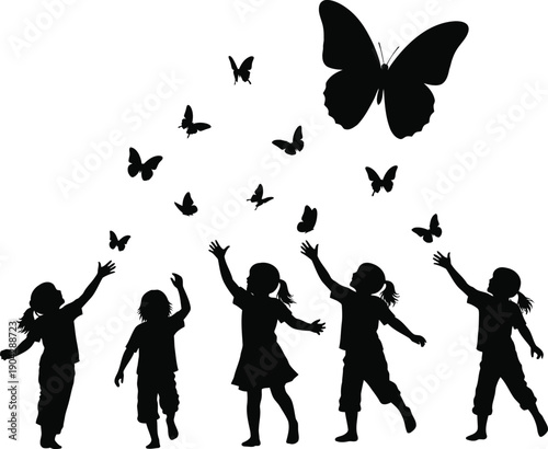 Children silhouettes chasing butterflies in flight