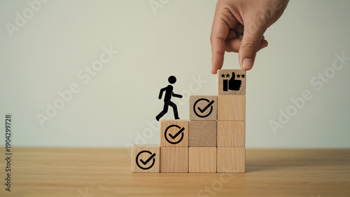 Businessman achieving success with wooden block steps and checkmarks