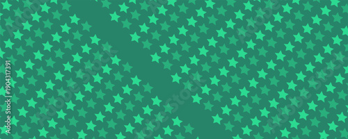 Dark green background from metal foil paper with a pattern of sparkling stars closeup. Texture of metallized wrapping holiday paper surface.