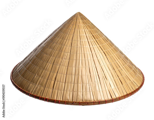 Traditional conical hat made of woven natural fibers on black background