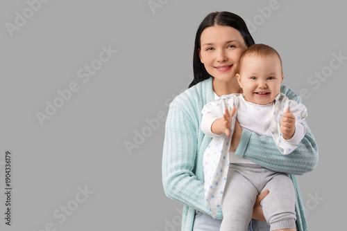 Young mother with her littl...