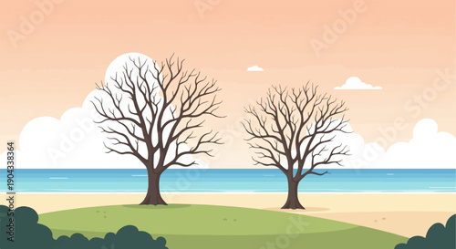 Bare trees stand on grassy shore before blue sea under pale sky
