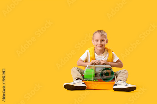 Happy little boy with cage ...