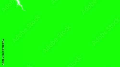 Intense electrical storm bolts flash brightly across a vibrant green screen background providing easy keying for visual effects production