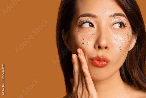 Beautiful young Asian woman...