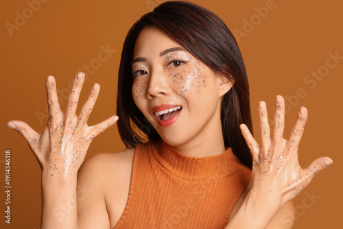 Beautiful young happy Asian...