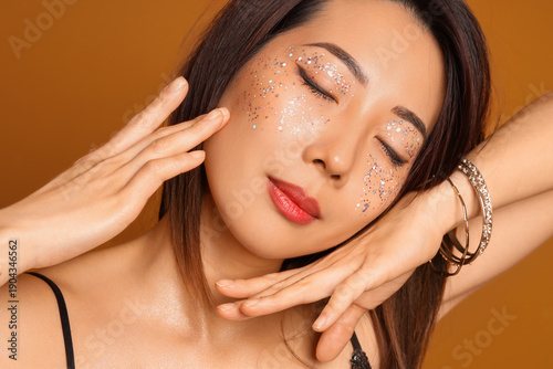 Beautiful young Asian woman...