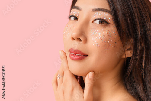 Beautiful young Asian woman...