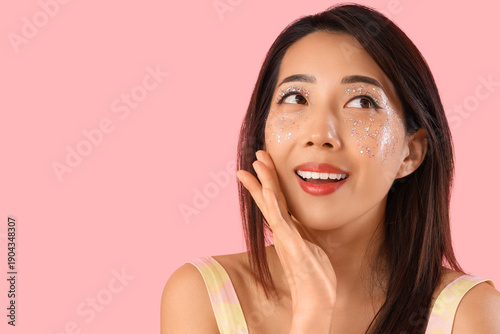 Beautiful young happy Asian...